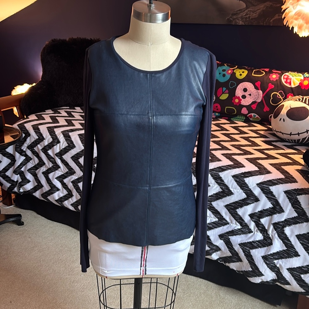 Woman’s navy blue long sleeved faux leather and jersey knit top size medium